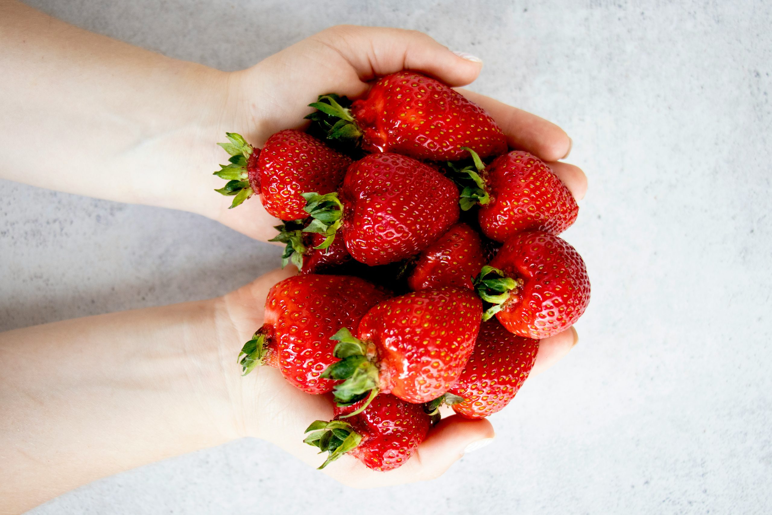 A colorful plate of strawberries